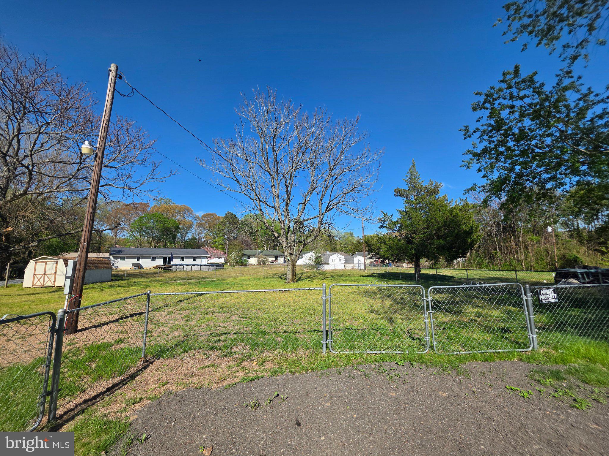 150 West Street Magnolia, DE 19962 - Photo 24 of 26 Spacious lot with serene greenery.