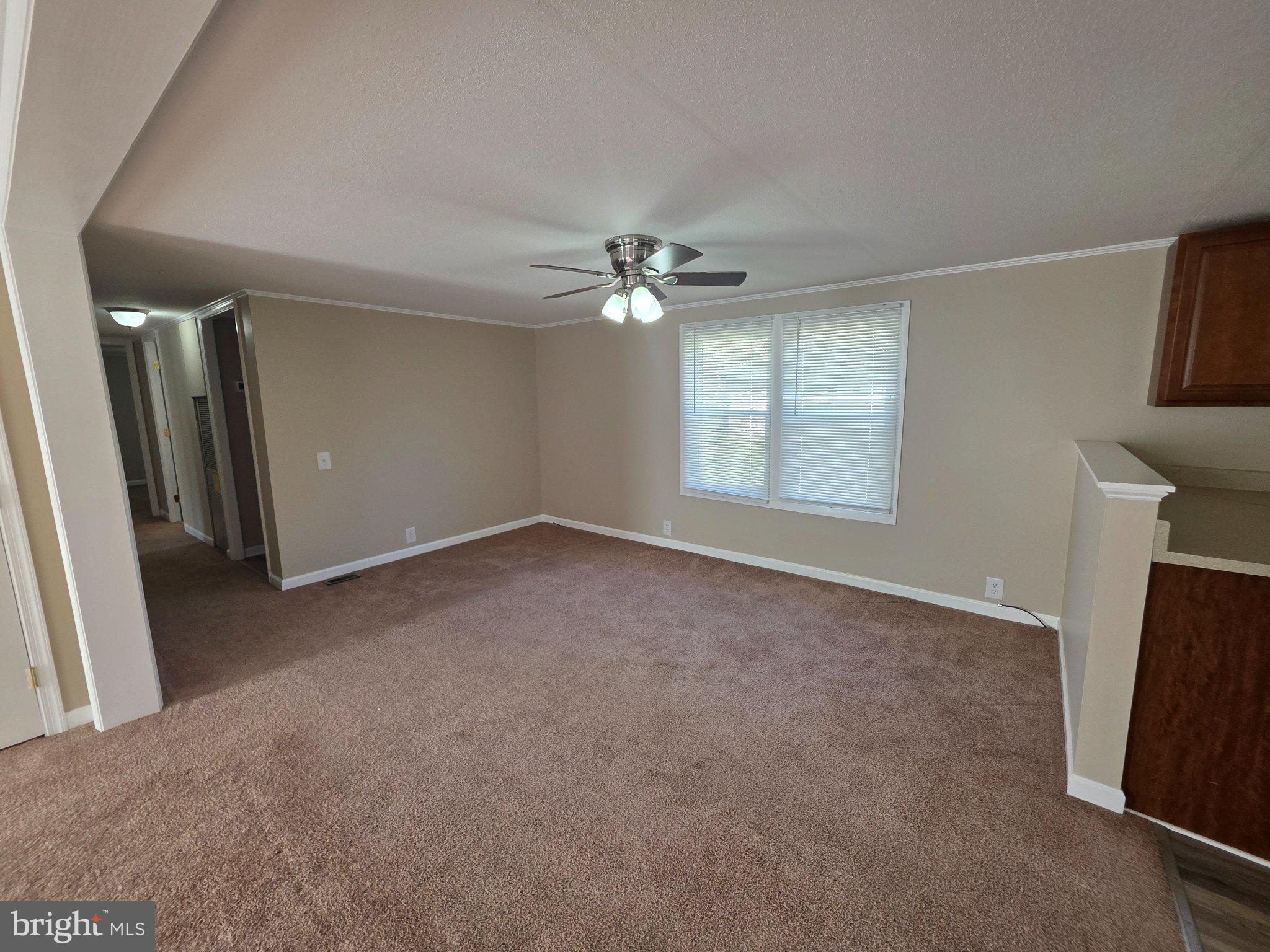 150 West Street Magnolia, DE 19962 - Photo 4 of 26 Spacious living area with natural light.
