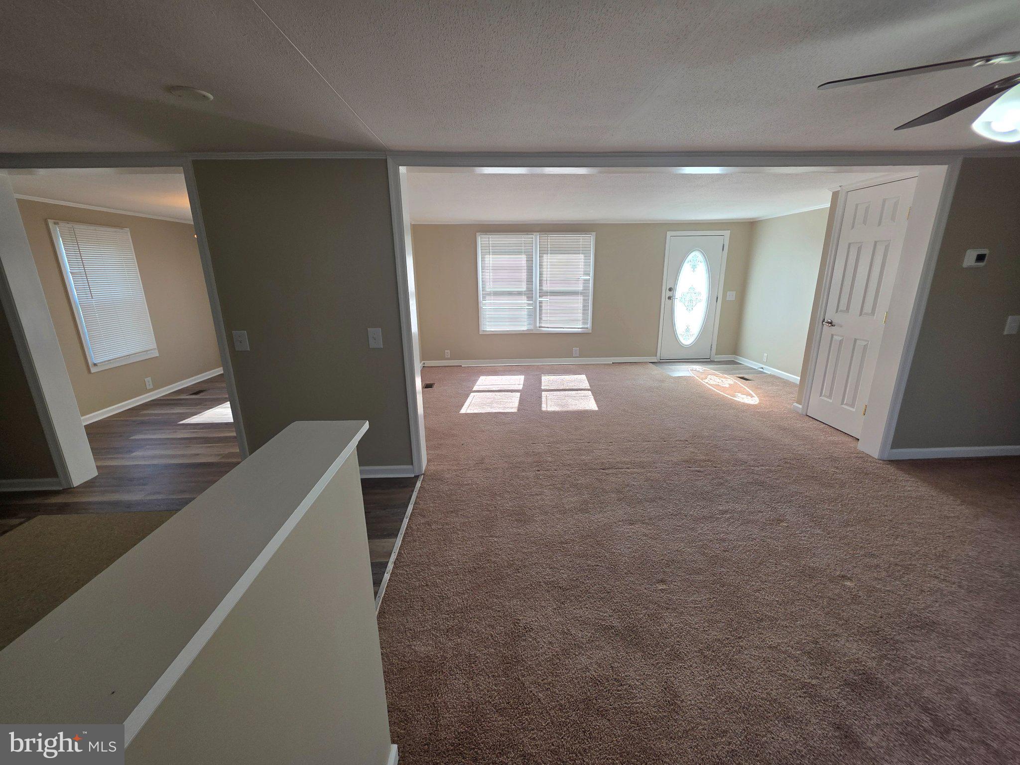 150 West Street Magnolia, DE 19962 - Photo 6 of 26 Spacious, sunlit living area awaits you.