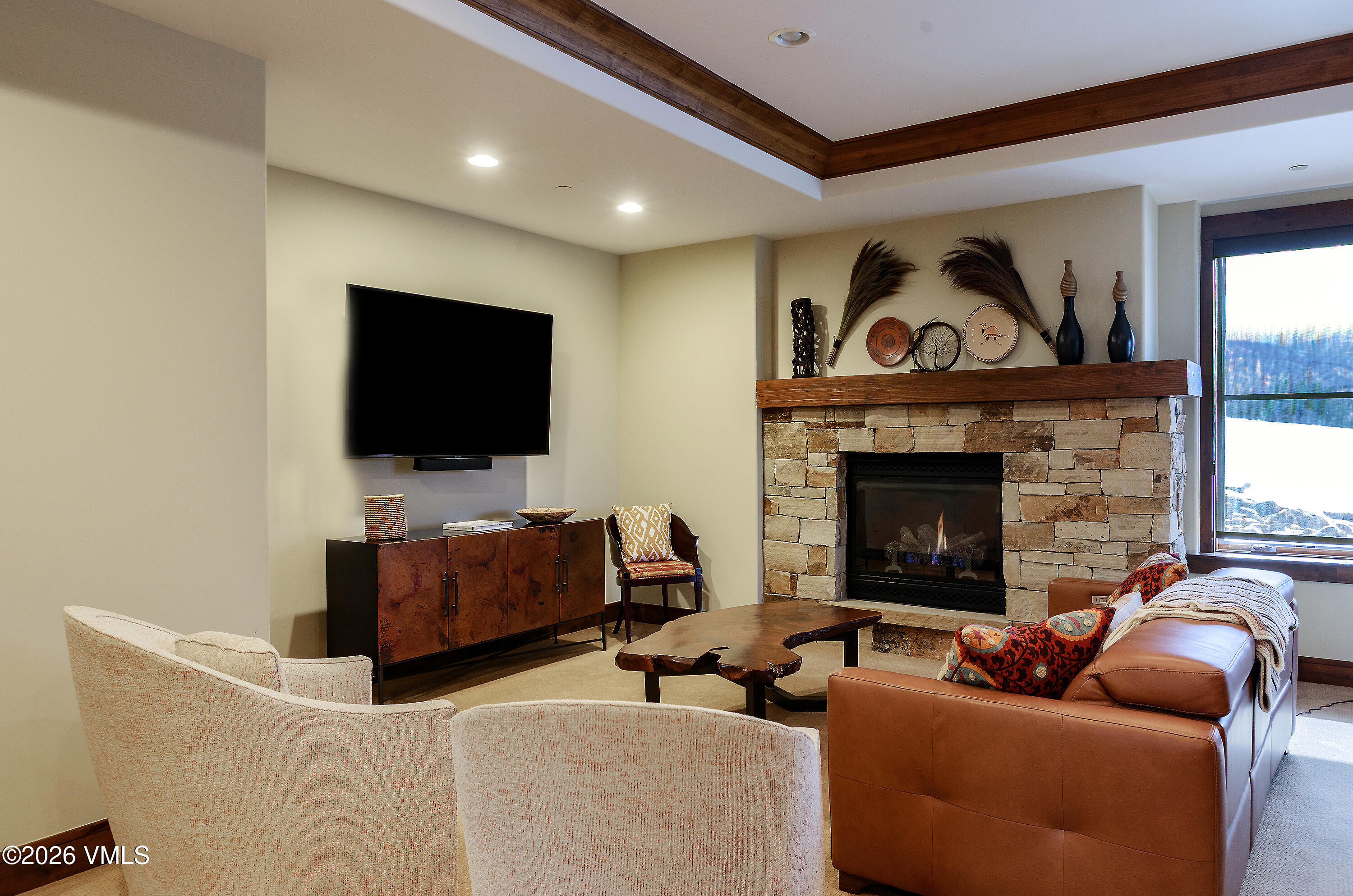 2753 East Haystacker Drive Eagle, CO 81631 - Photo 30 of 41 a living room with furniture and a flat screen tv