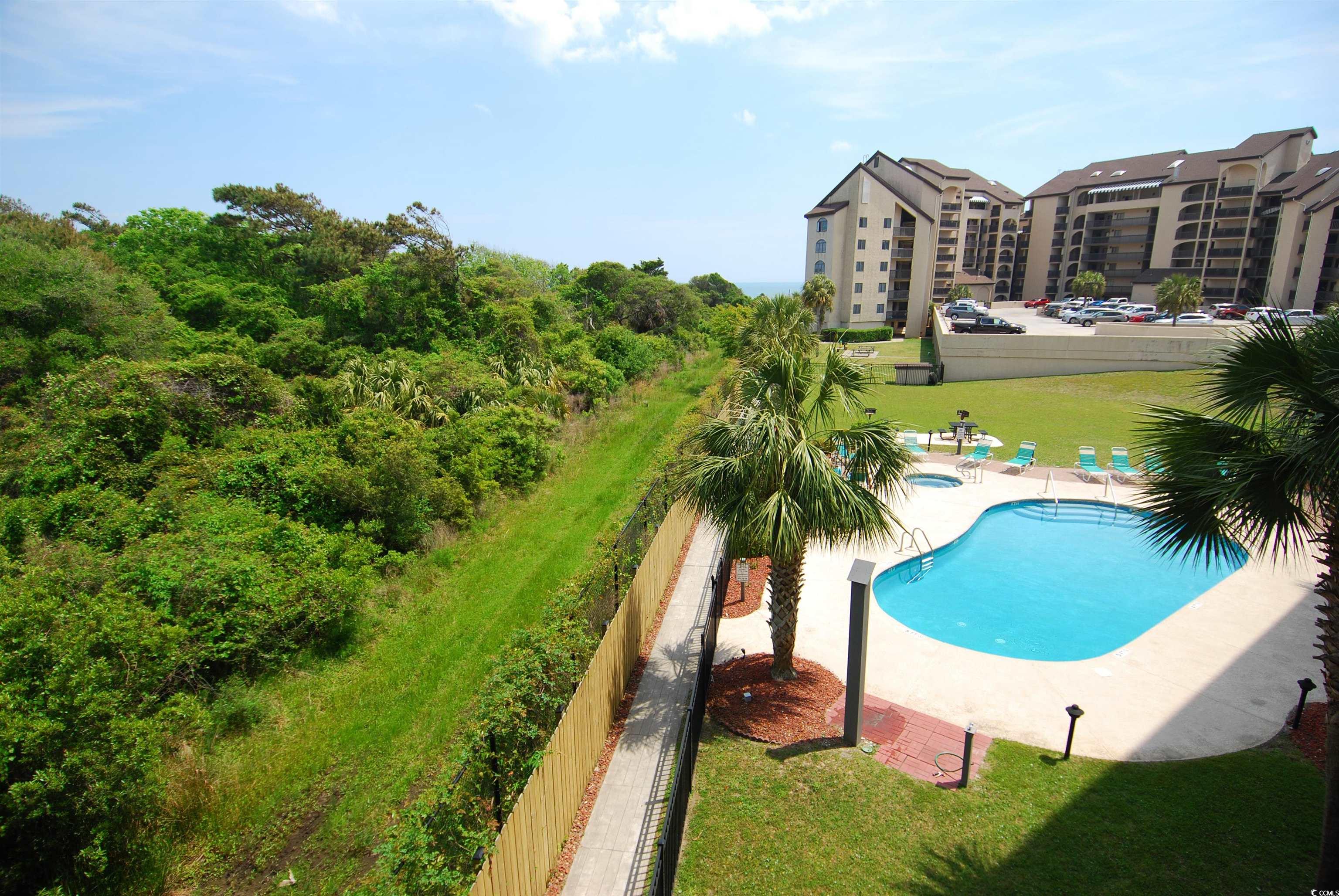 200 Lands End Boulevard, Unit 2015 Myrtle Beach, SC 29572 - Photo 24 of 28 View of pool with a patio