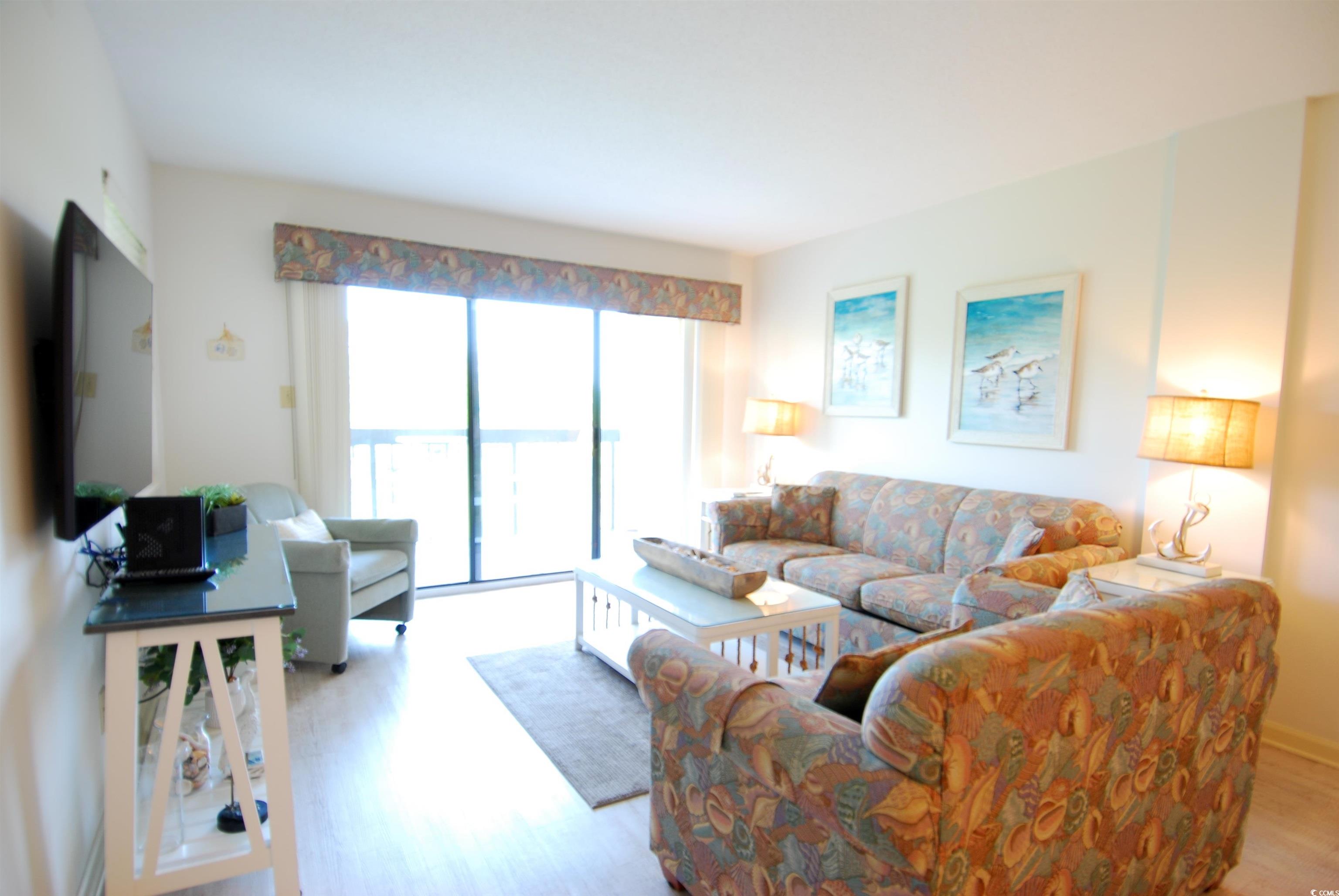 200 Lands End Boulevard, Unit 2015 Myrtle Beach, SC 29572 - Photo 5 of 28 Living room with light wood-type flooring