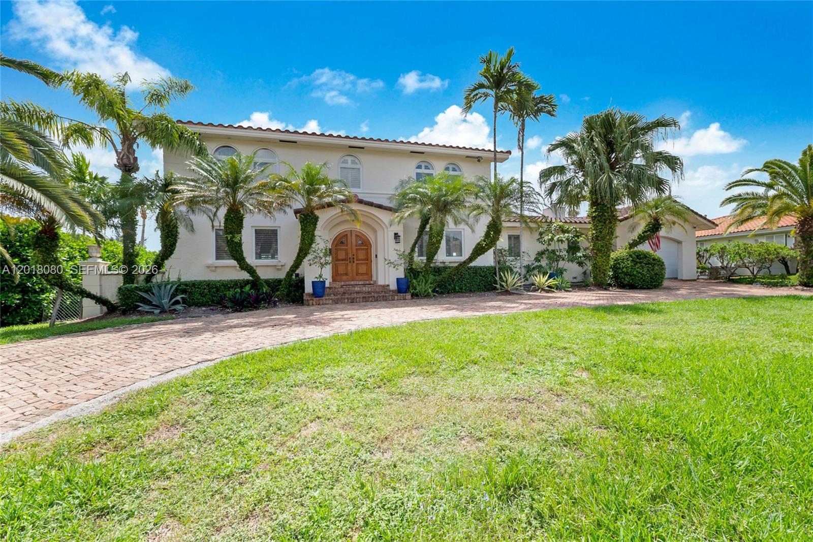 13035 Nevada Street Coral Gables, FL 33156 - Photo 1 of 21 a view of a street with a building in the background
