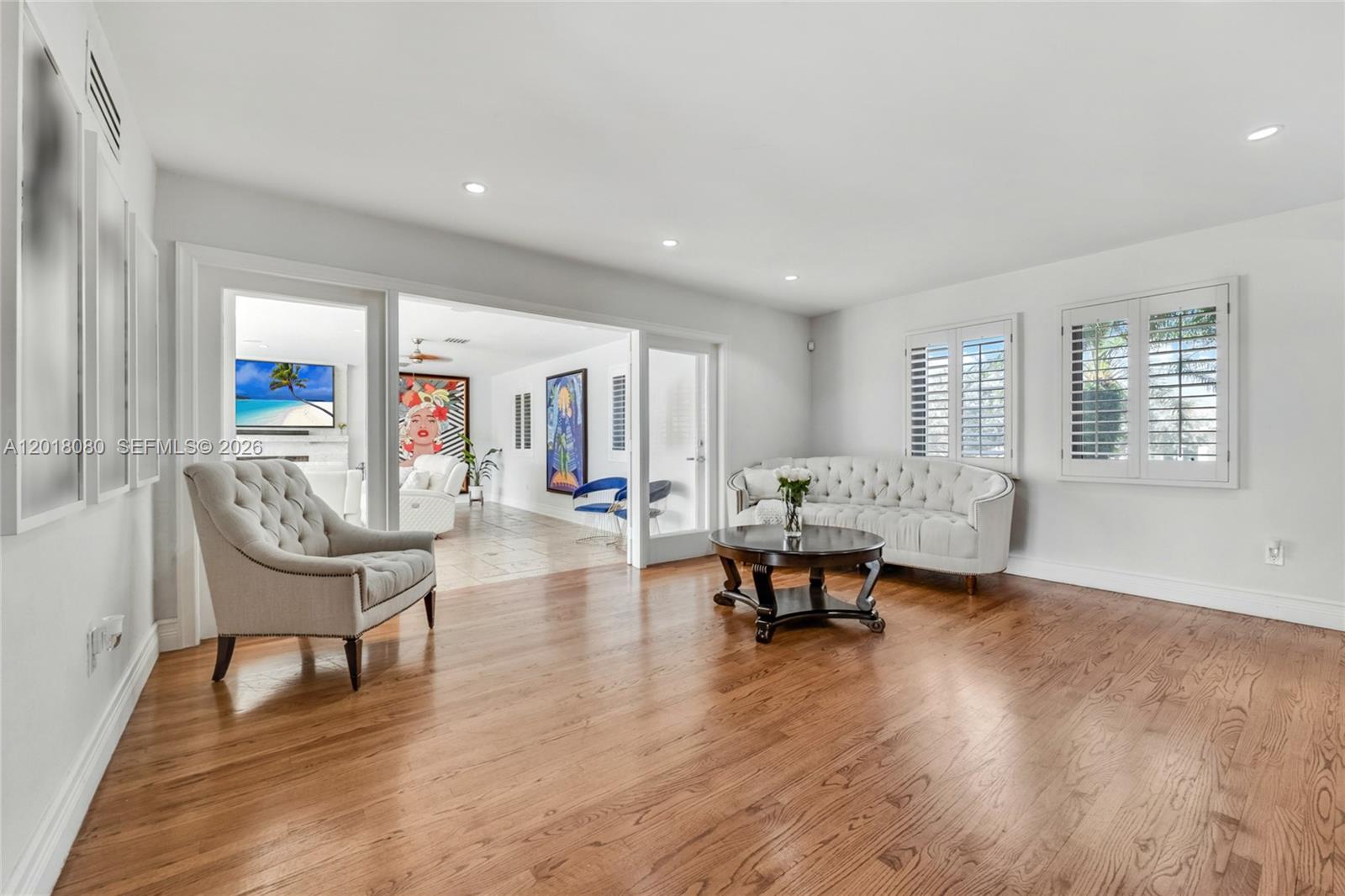13035 Nevada Street Coral Gables, FL 33156 - Photo 11 of 21 a living room with furniture and a wooden floor
