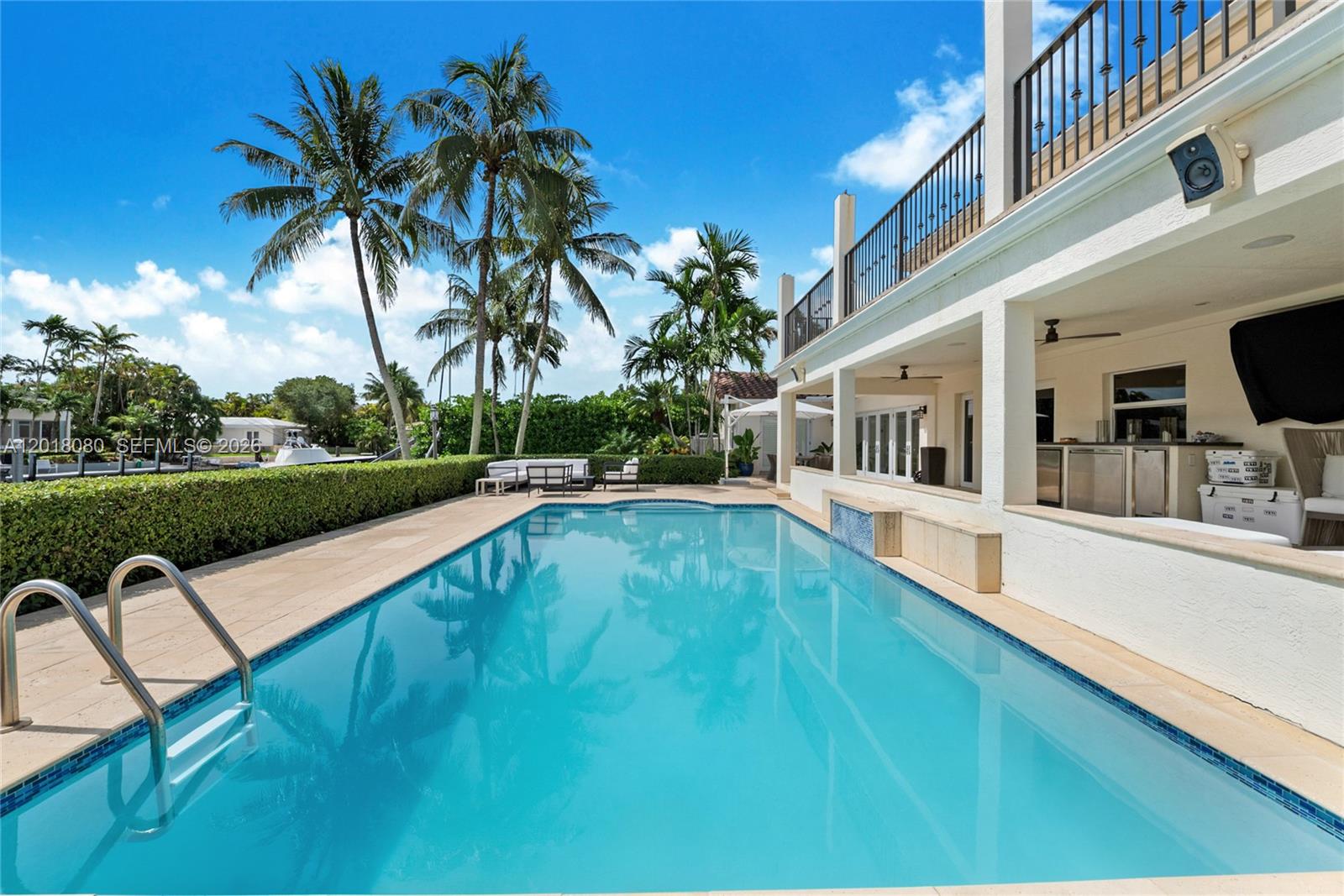 13035 Nevada Street Coral Gables, FL 33156 - Photo 21 of 21 a view of a swimming pool with a patio