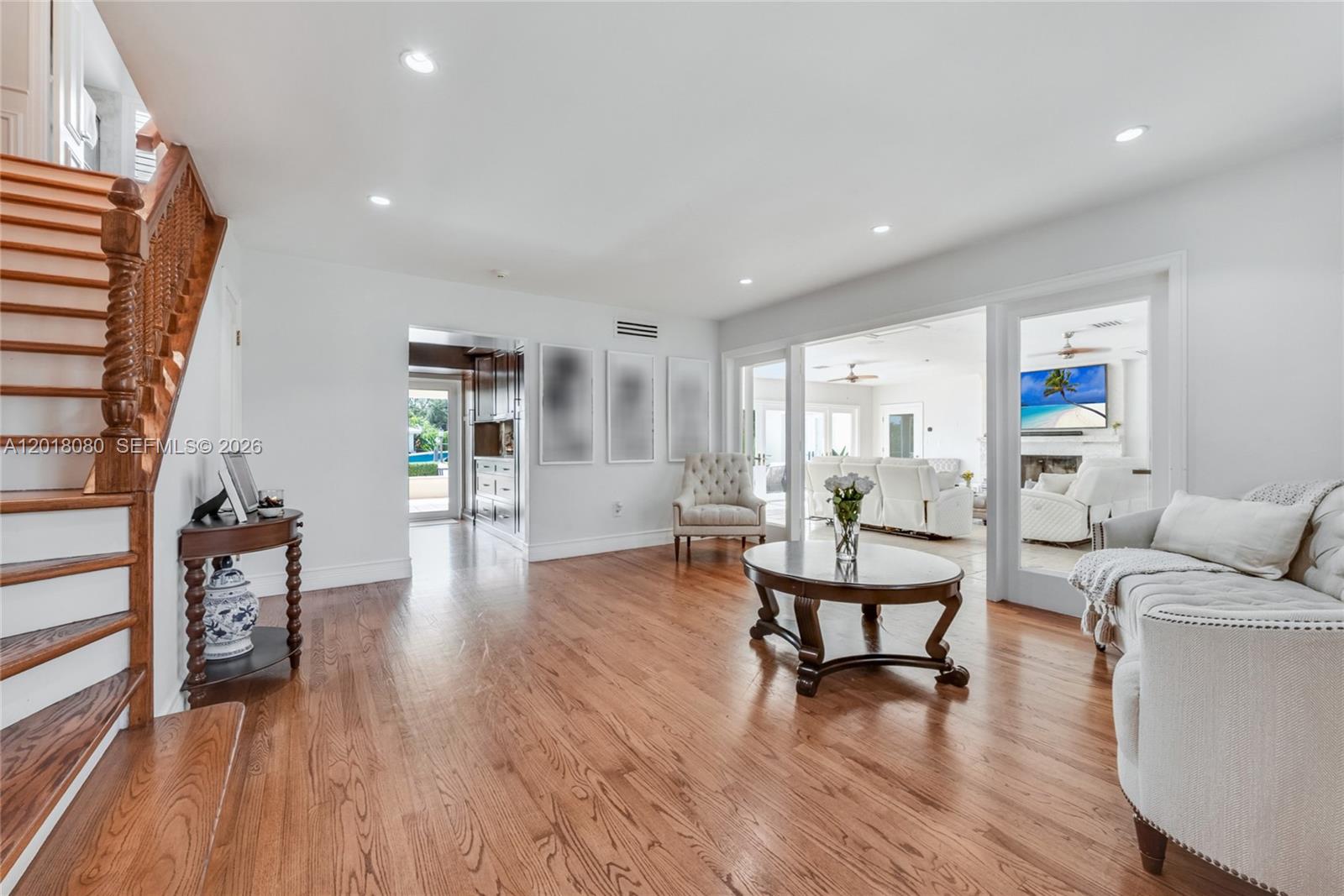 13035 Nevada Street Coral Gables, FL 33156 - Photo 10 of 21 a living room with furniture and a wooden floor