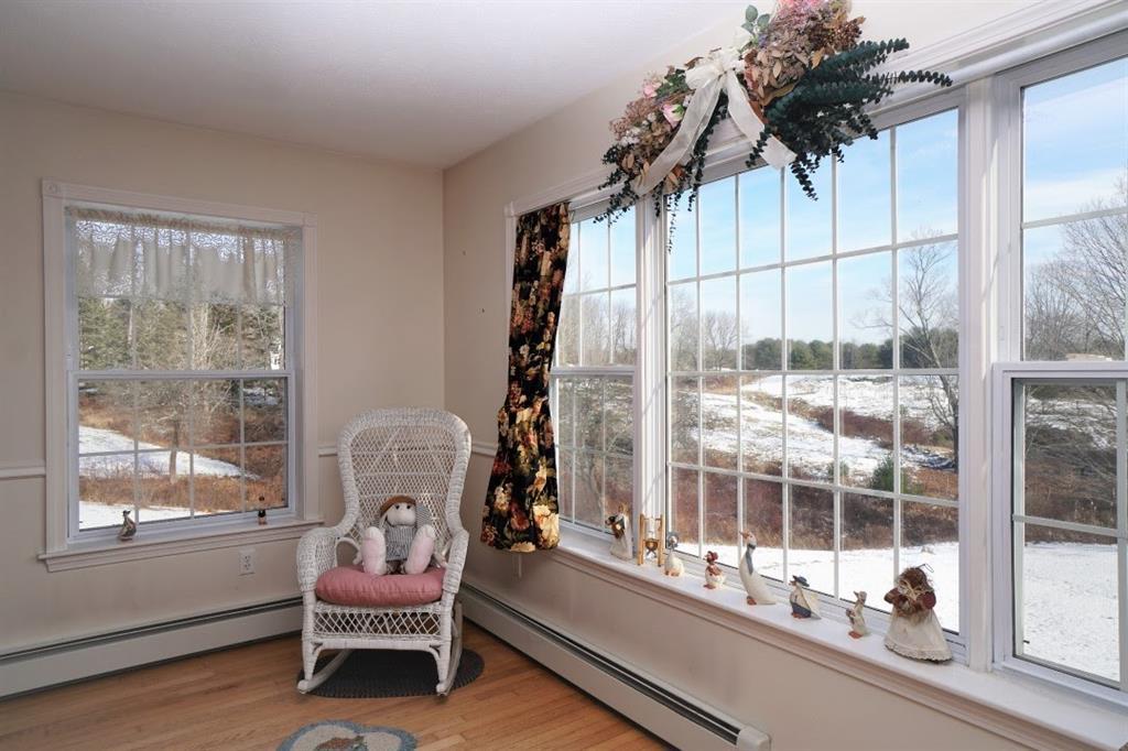 125 Chute Road Windham, ME 04062 - Photo 12 of 35 Living room has an amazing light and...