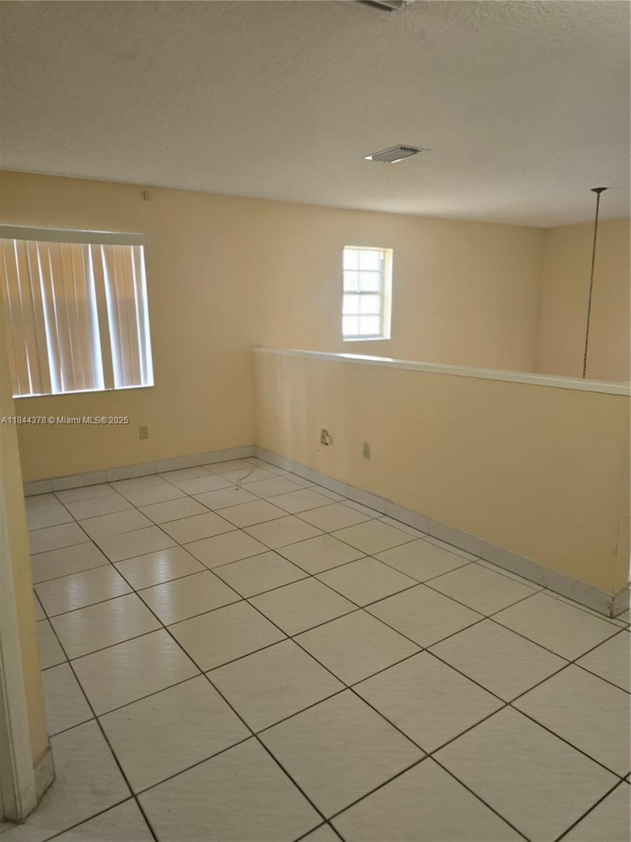 13748 Southwest 155th Terrace Miami, FL 33177 - Photo 12 of 12 a view of empty room