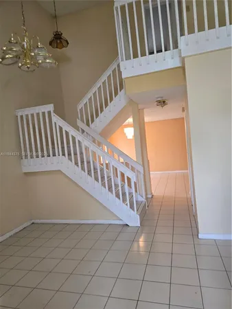 a view of an entryway with a floor