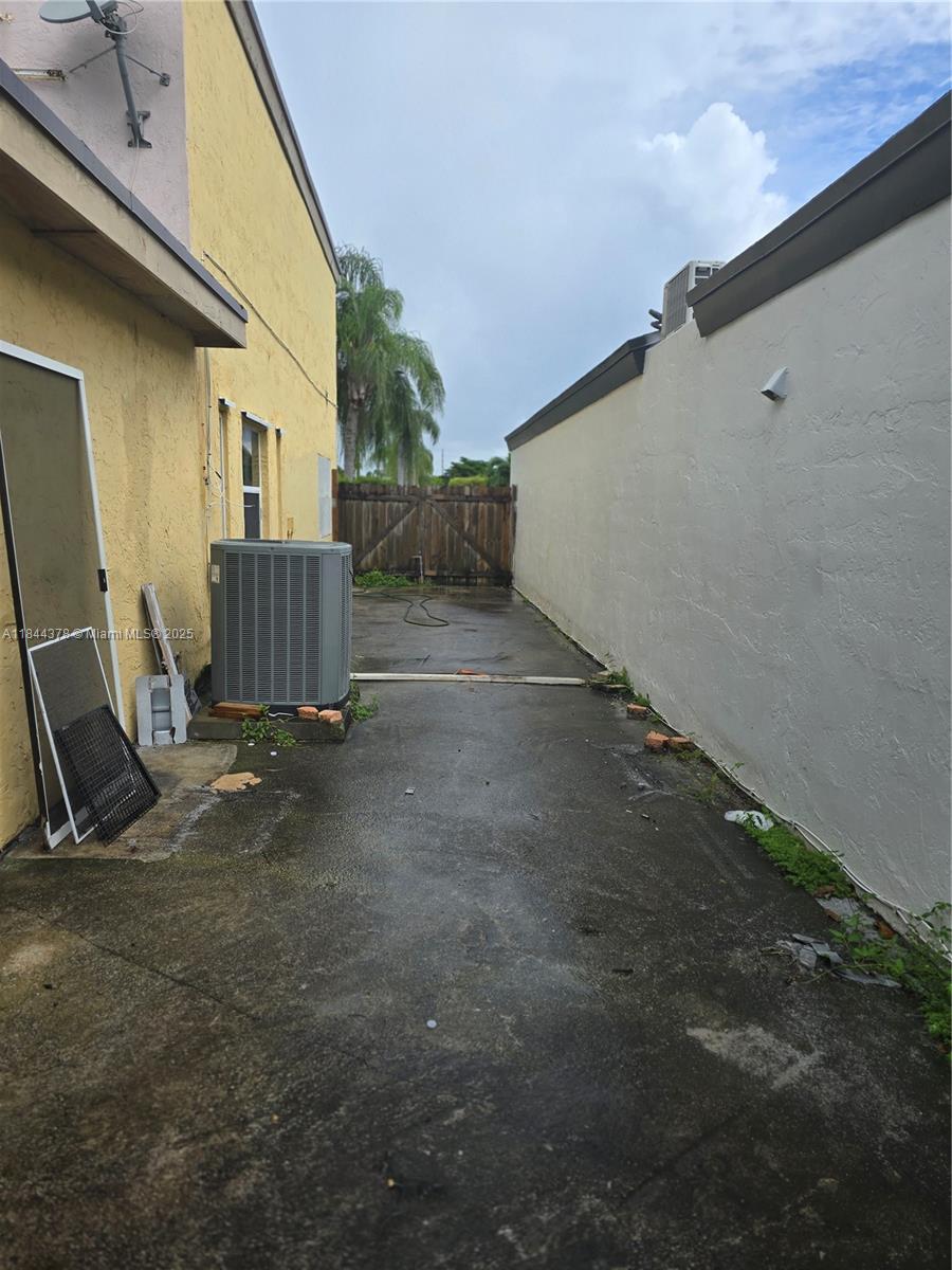 13748 Southwest 155th Terrace Miami, FL 33177 - Photo 10 of 12 a view of a back yard of the house