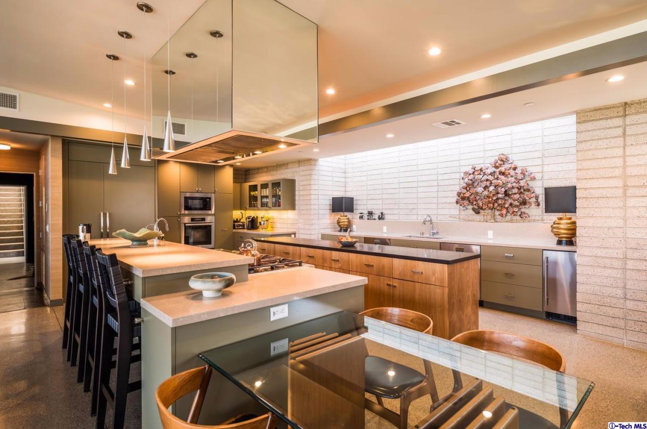 3645 Deerpass Road Glendale, CA 91208 - Photo 13 of 39 a kitchen with stainless steel appliances granite countertop a sink a stove and a refrigerator