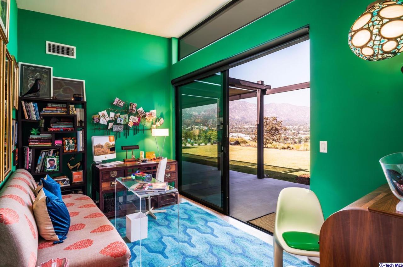 3645 Deerpass Road Glendale, CA 91208 - Photo 17 of 39 a living room with furniture and a large window