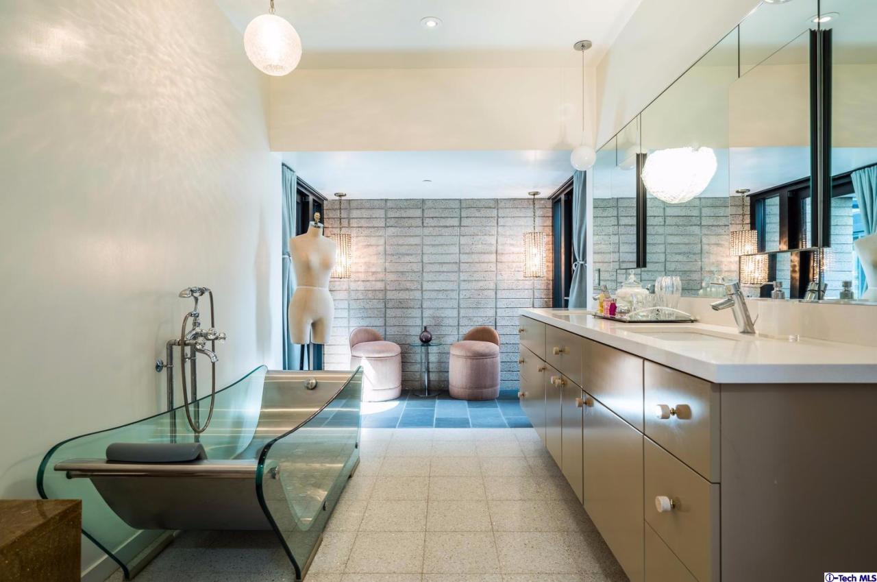 3645 Deerpass Road Glendale, CA 91208 - Photo 26 of 39 a living room with furniture and a large mirror