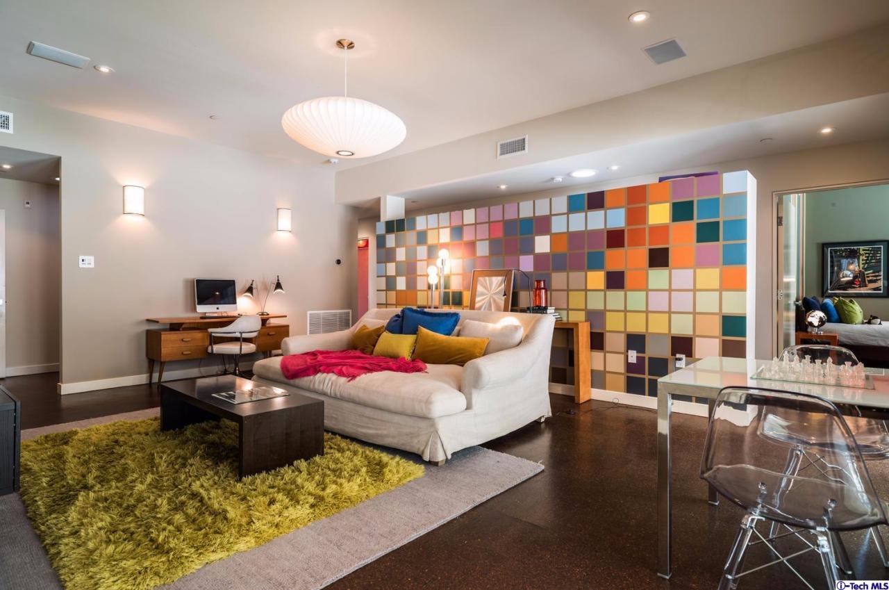 3645 Deerpass Road Glendale, CA 91208 - Photo 29 of 39 a living room with furniture and a flat screen tv