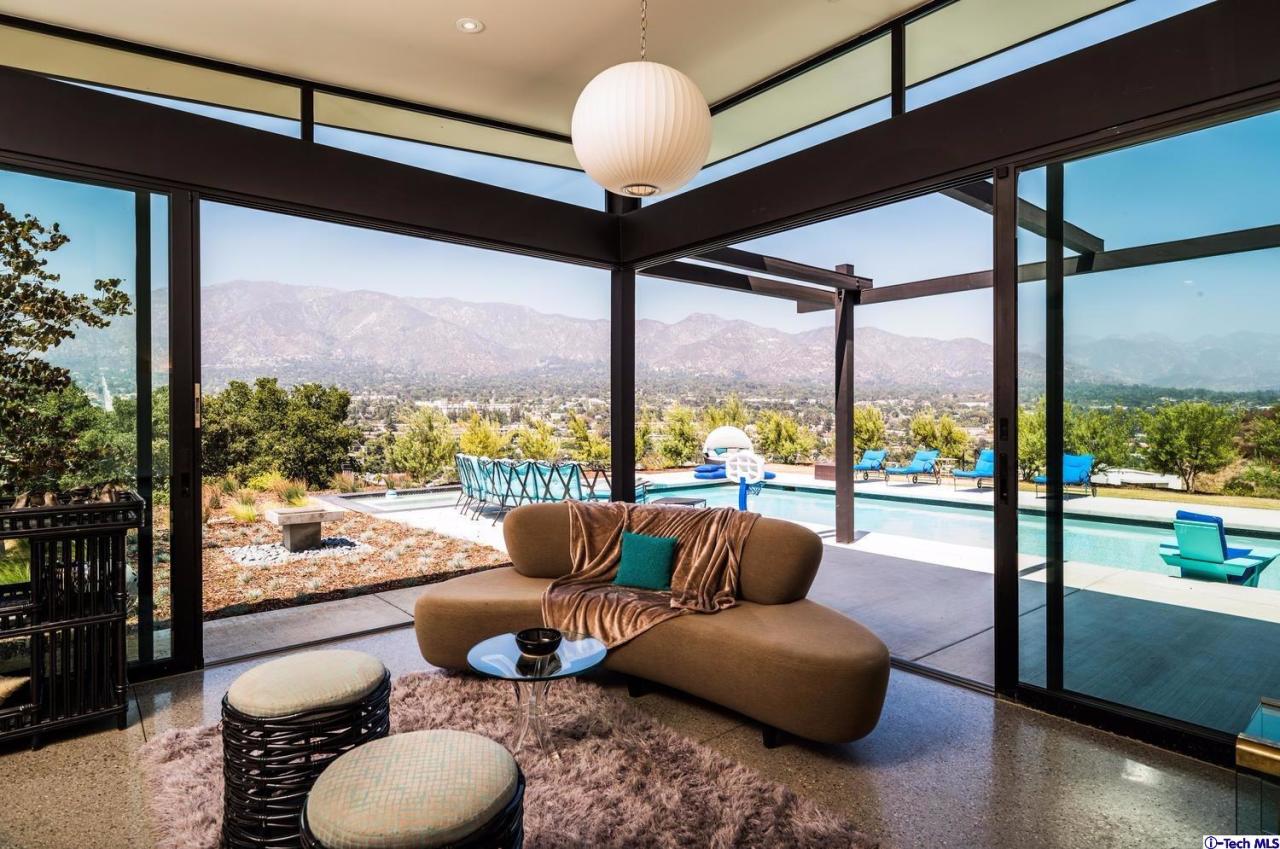 3645 Deerpass Road Glendale, CA 91208 - Photo 7 of 39 a living room with furniture and a floor to ceiling window
