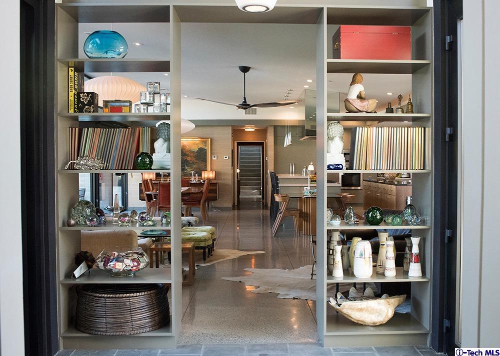 3645 Deerpass Road Glendale, CA 91208 - Photo 9 of 39 an outdoor living room with fireplace and lots of wooden floor