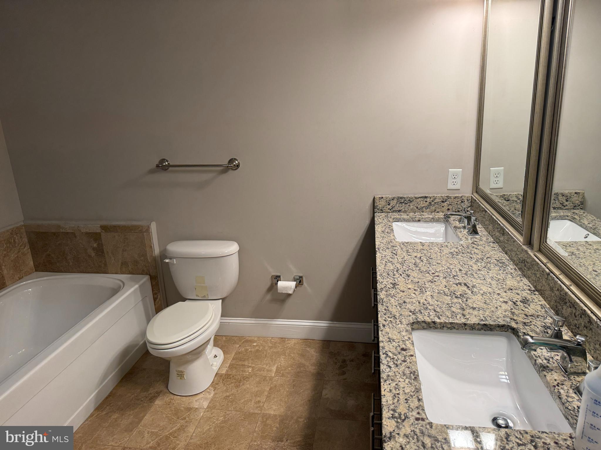 6301 Edsall Road, Unit 102 Alexandria, VA 22312 - Photo 11 of 24 a bathroom with a sink toilet and shower