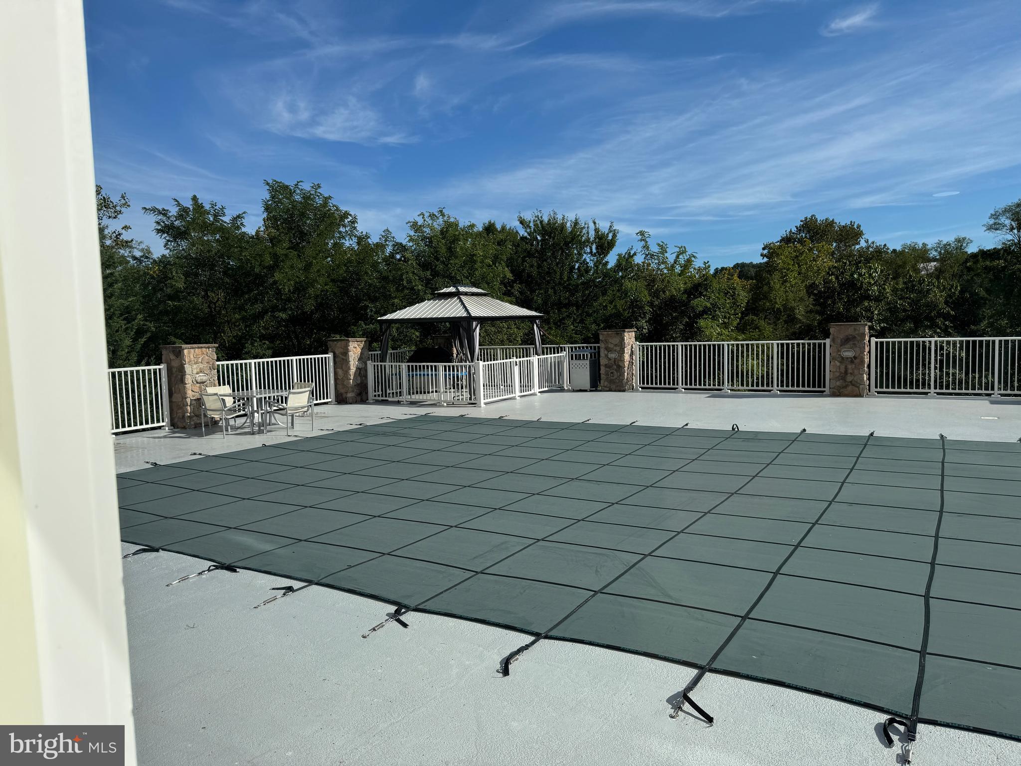 6301 Edsall Road, Unit 102 Alexandria, VA 22312 - Photo 18 of 24 a view of a swimming pool with a patio