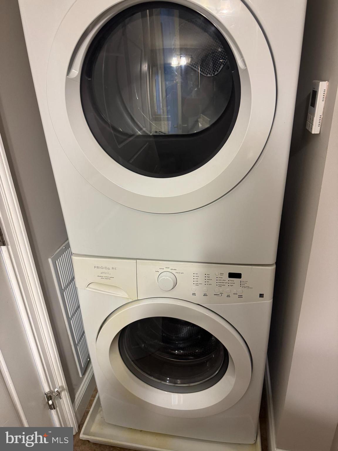 6301 Edsall Road, Unit 102 Alexandria, VA 22312 - Photo 4 of 24 a utility room with dryer and washer
