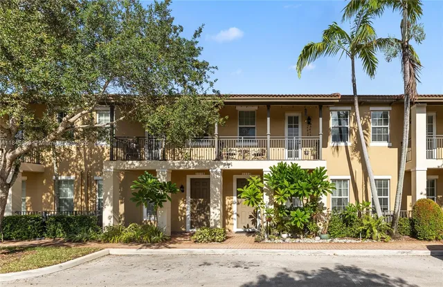 front view of a house with a street