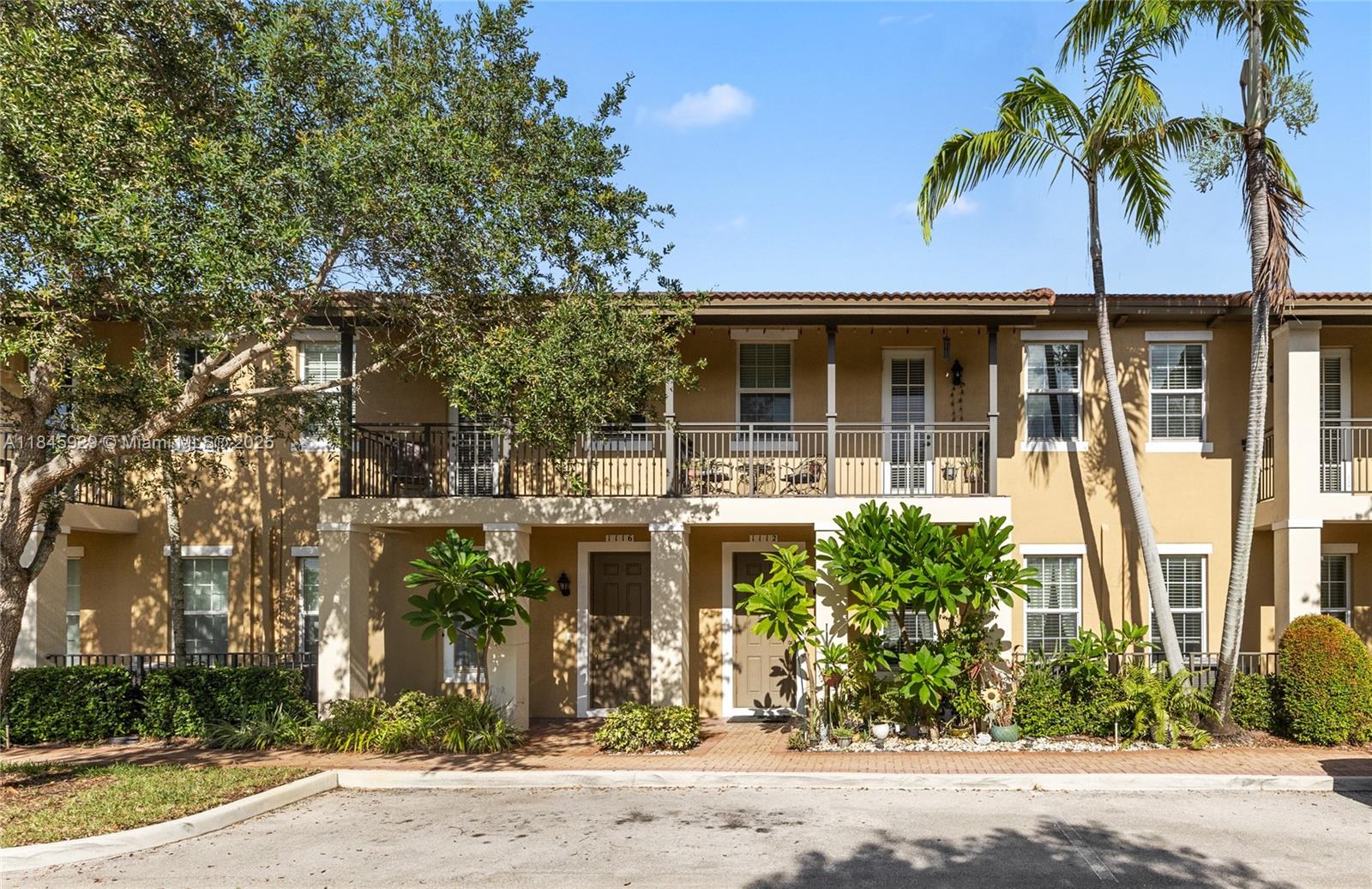 front view of a house with a street