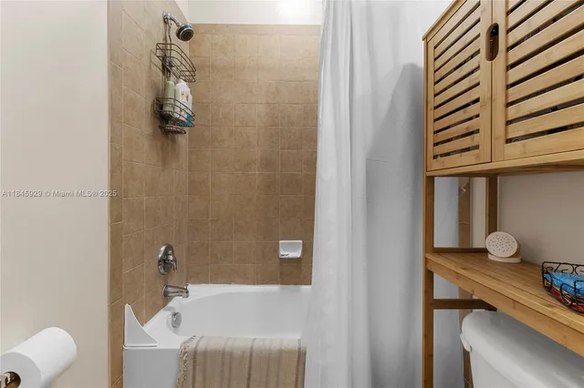 a bathroom with a sink and a bathtub