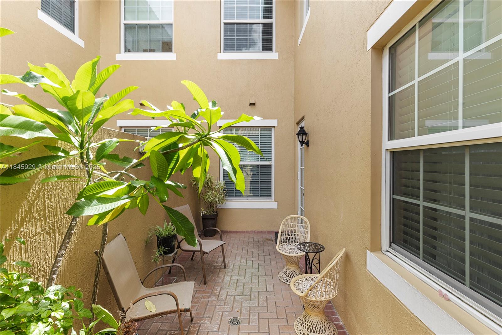 1112 Southwest 146th Terrace Pembroke Pines, FL 33027 - Photo 34 of 42 a vase of flowers sitting on a table