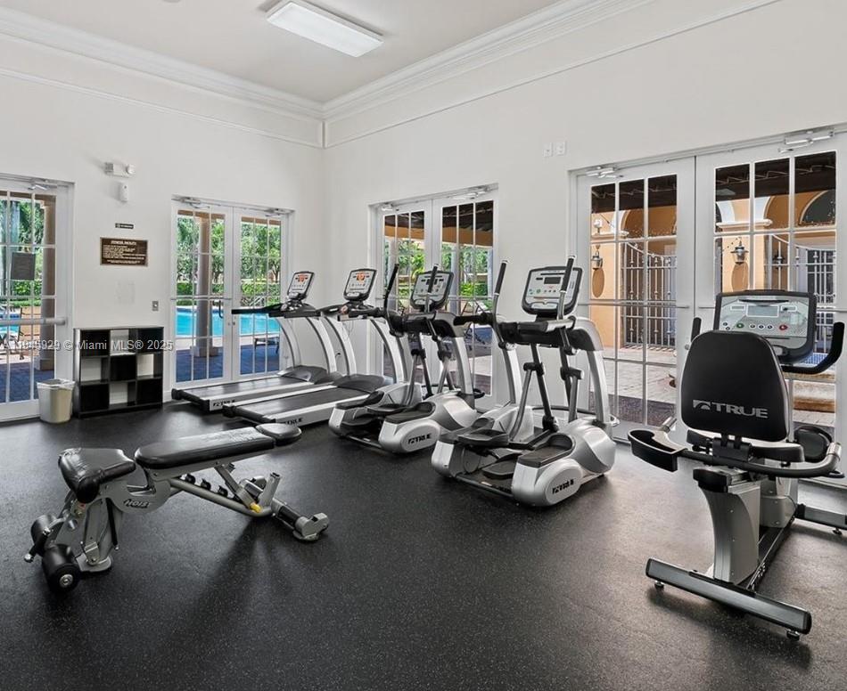 1112 Southwest 146th Terrace Pembroke Pines, FL 33027 - Photo 41 of 42 a view of a room with gym equipment