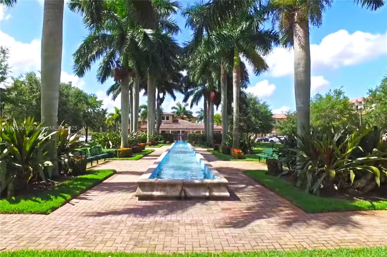 1112 Southwest 146th Terrace Pembroke Pines, FL 33027 - Photo 42 of 42 a view of small yard with palm trees