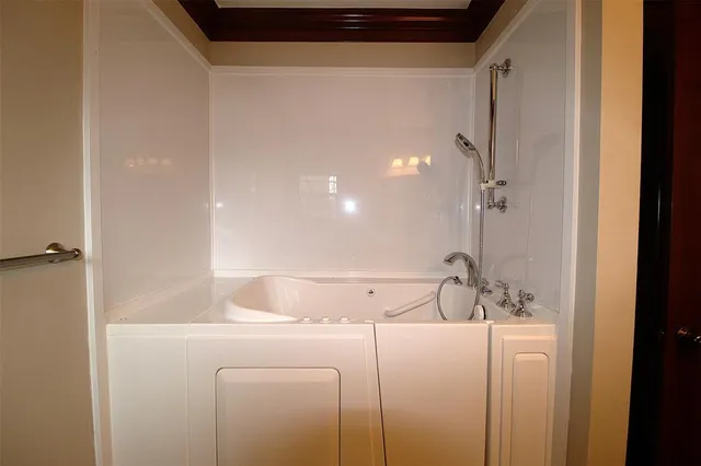a bathroom with a sink and mirror