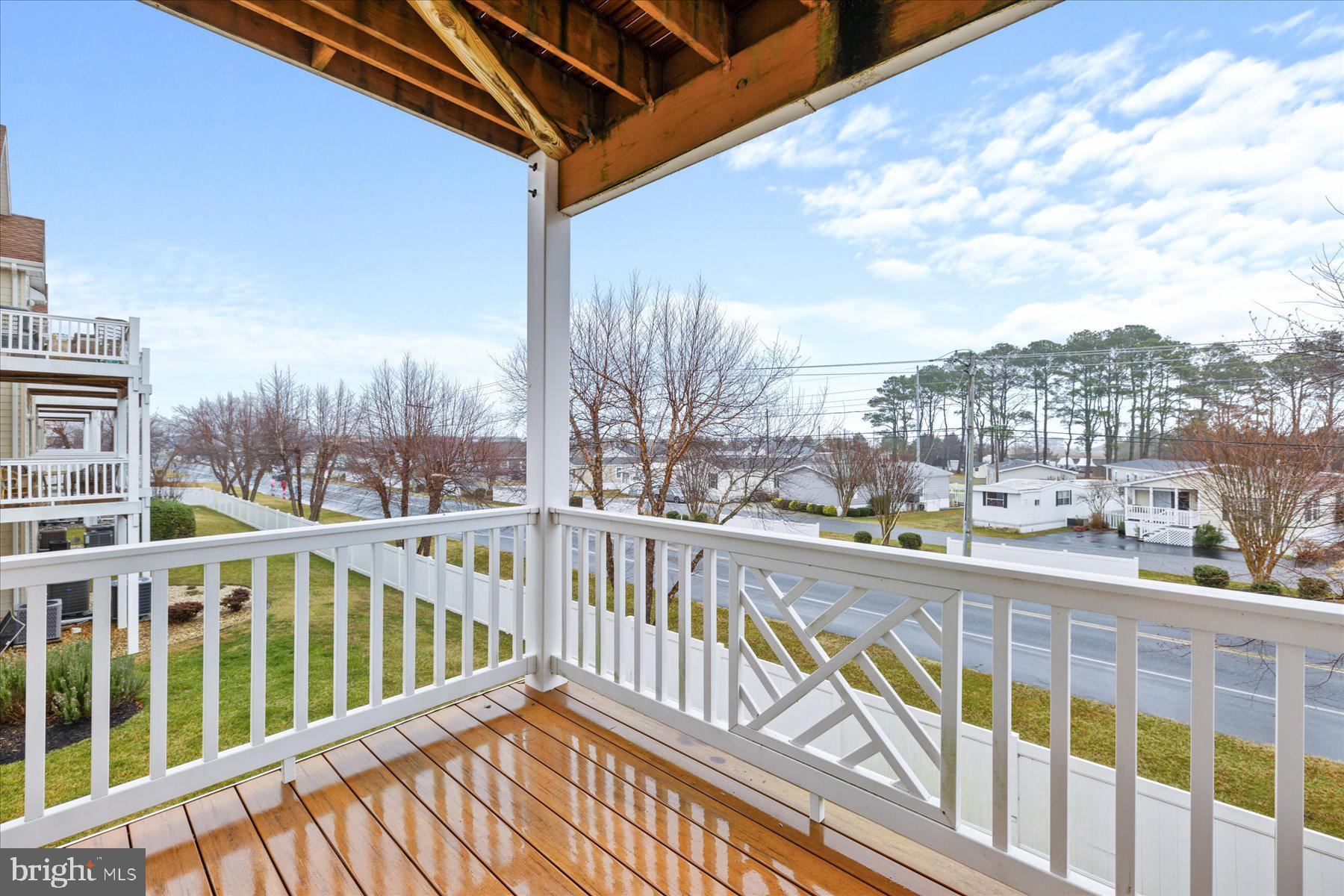 9823 Golf Course Road, Unit 10 Ocean City, MD 21842 - Photo 13 of 40 a view of city from a balcony