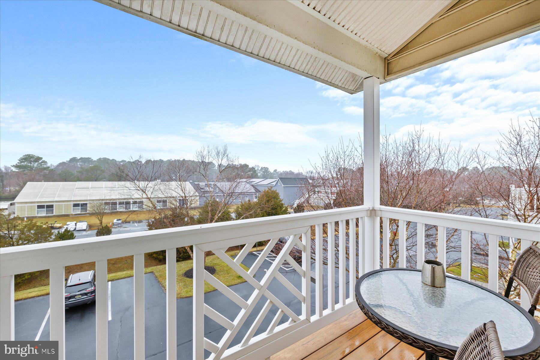 9823 Golf Course Road, Unit 10 Ocean City, MD 21842 - Photo 30 of 40 a view of a city from a balcony
