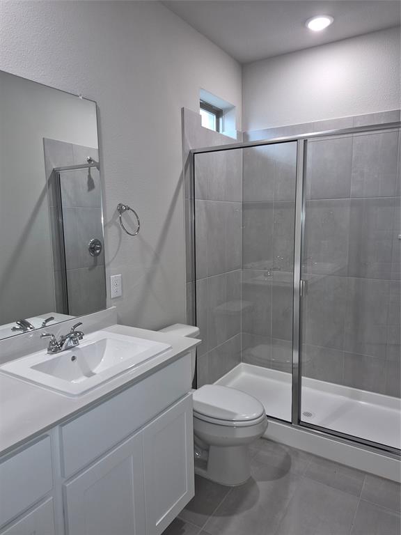 872 Sunflower Road Lavon, TX 75166 - Photo 6 of 12 a bathroom with a sink toilet and shower