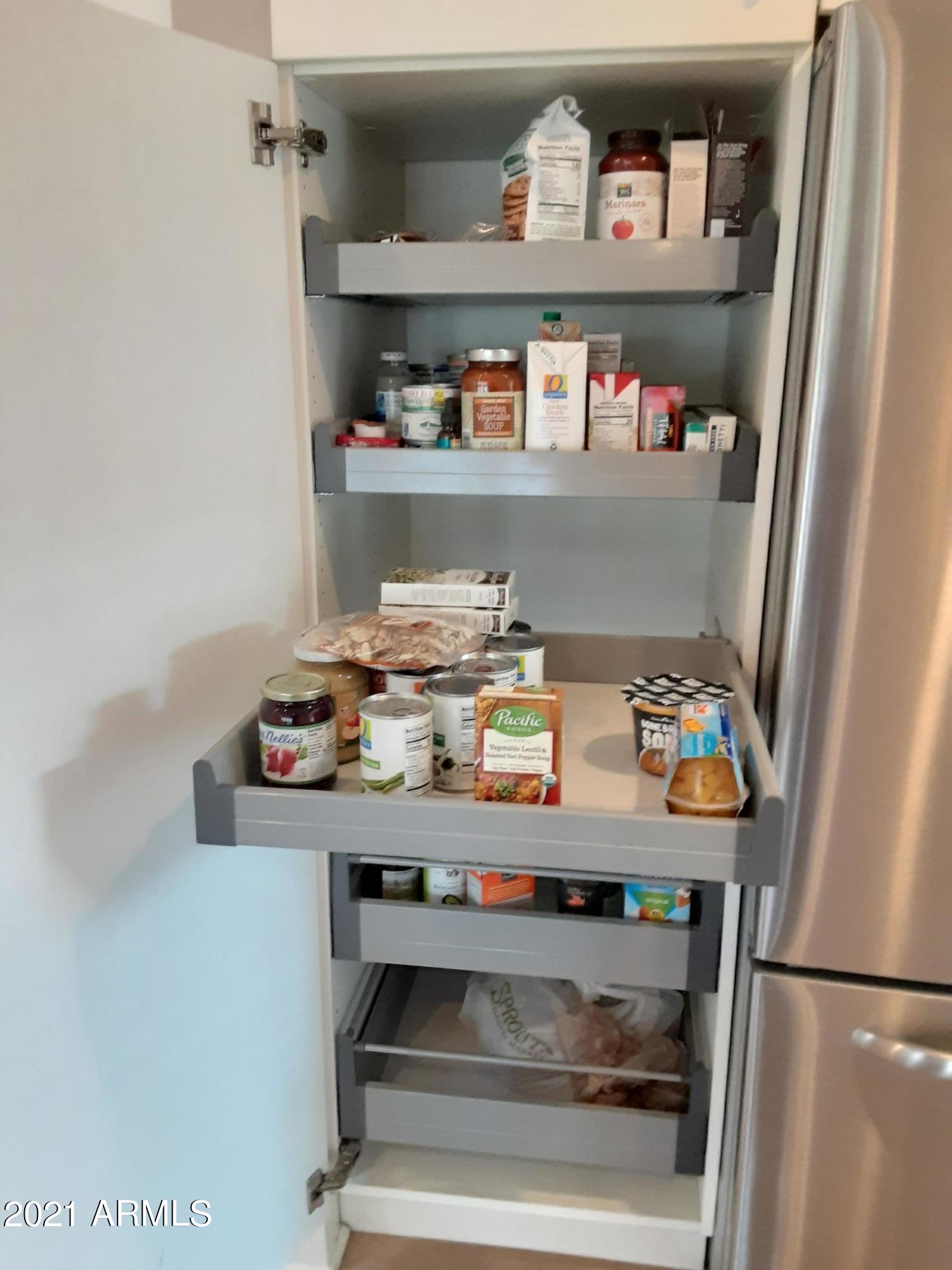 112 West Boca Raton Road Phoenix, AZ 85023 - Photo 11 of 48 Kitchen Pull-out shelves 1