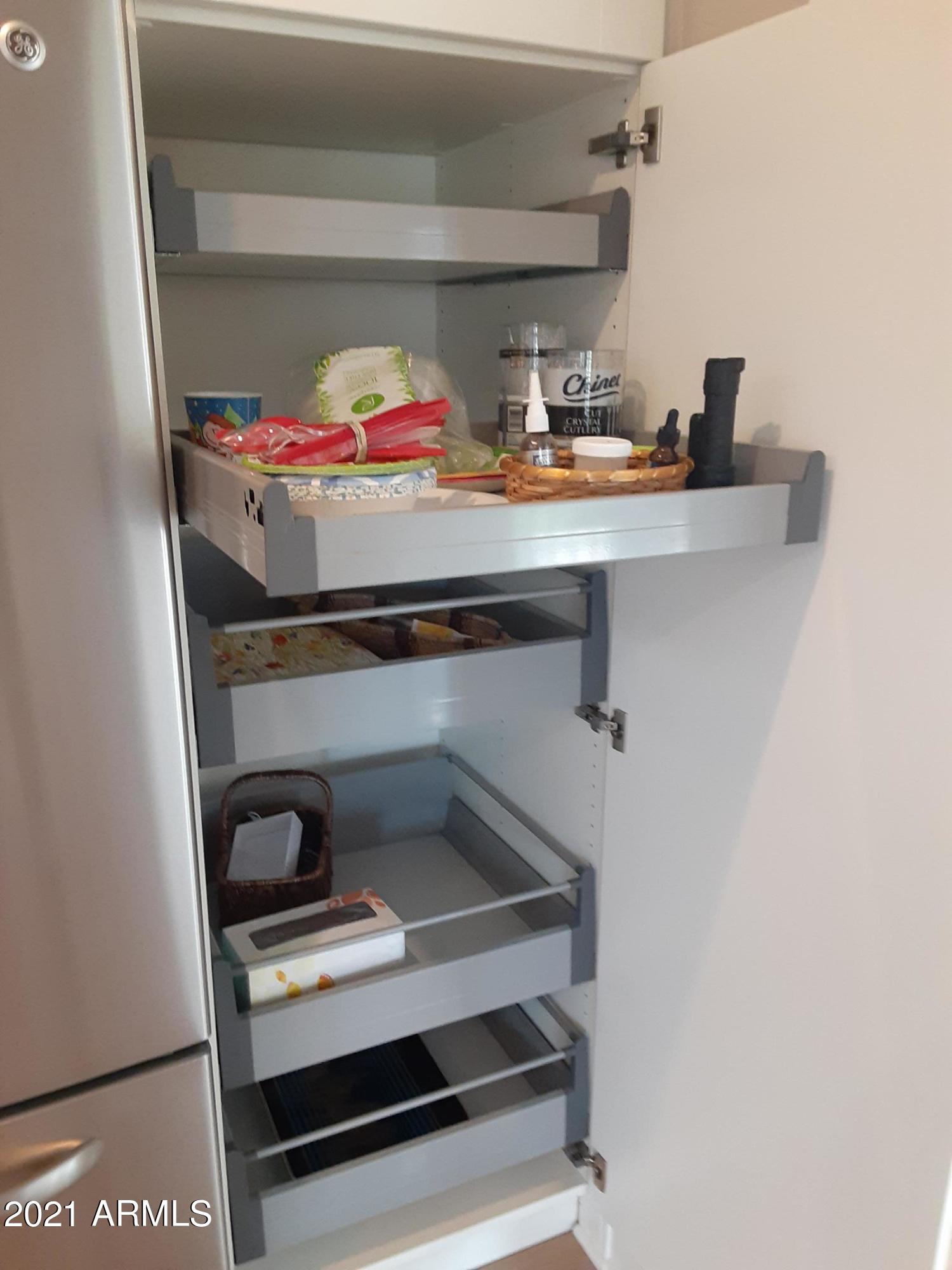 112 West Boca Raton Road Phoenix, AZ 85023 - Photo 12 of 48 Kitchen Pull-out Shelves 2