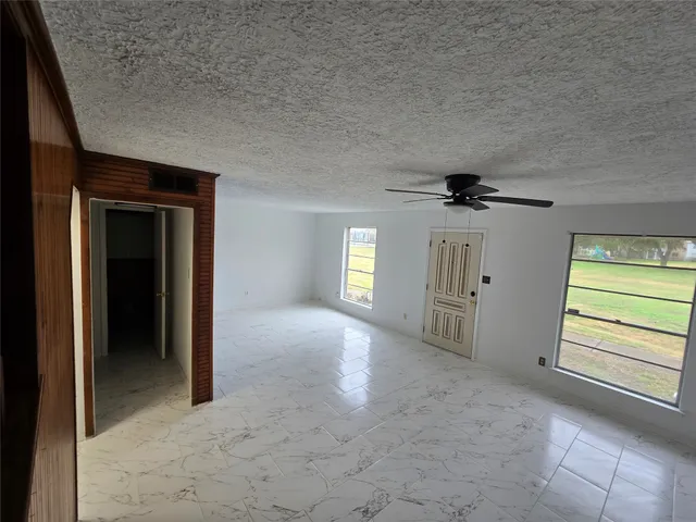 a bathroom with a sink mirror vanity and toilet