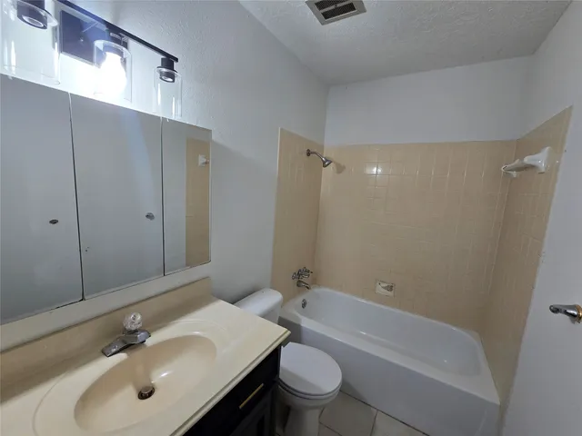 a view of balcony with wooden floor