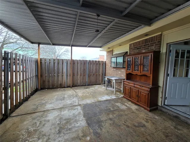 a view of a backyard of a house