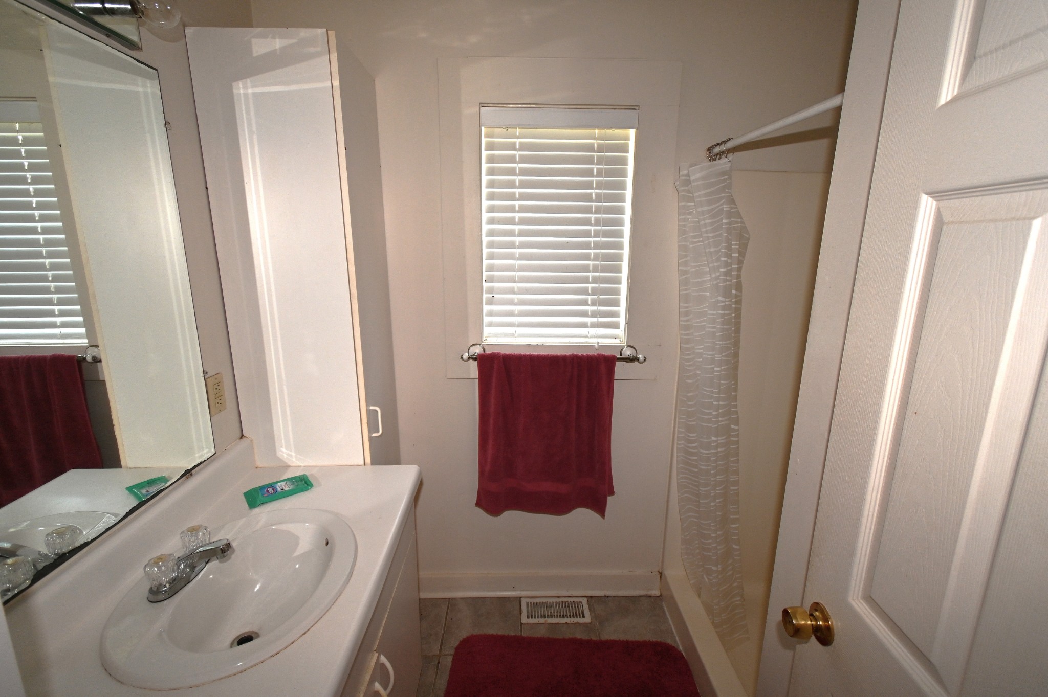 489 Doyle Road Linden, TN 37096 - Photo 31 of 70 a bathroom with a sink and a bath tub