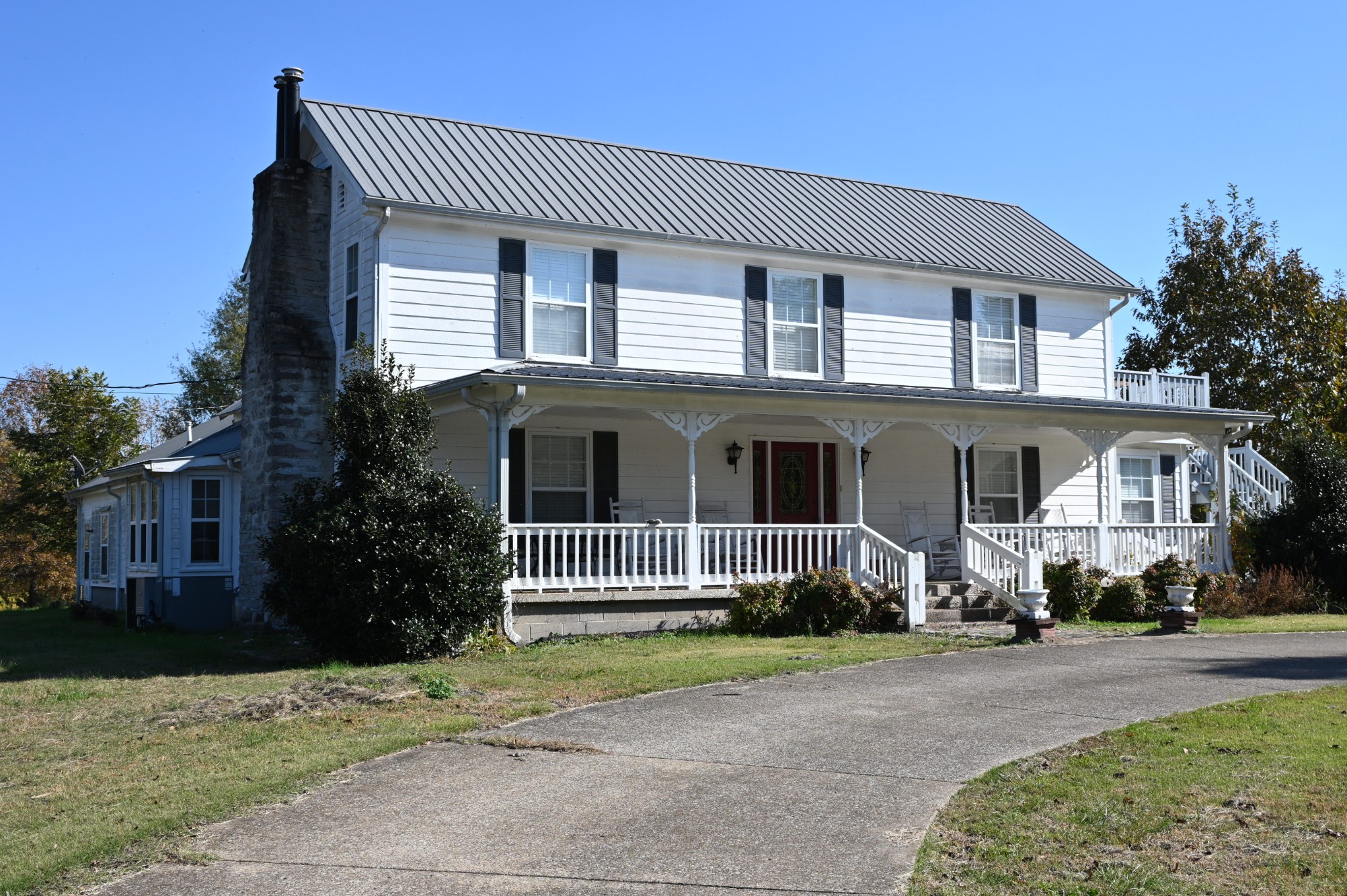 489 Doyle Road Linden, TN 37096 - Photo 70 of 70 a front view of a house with a garden