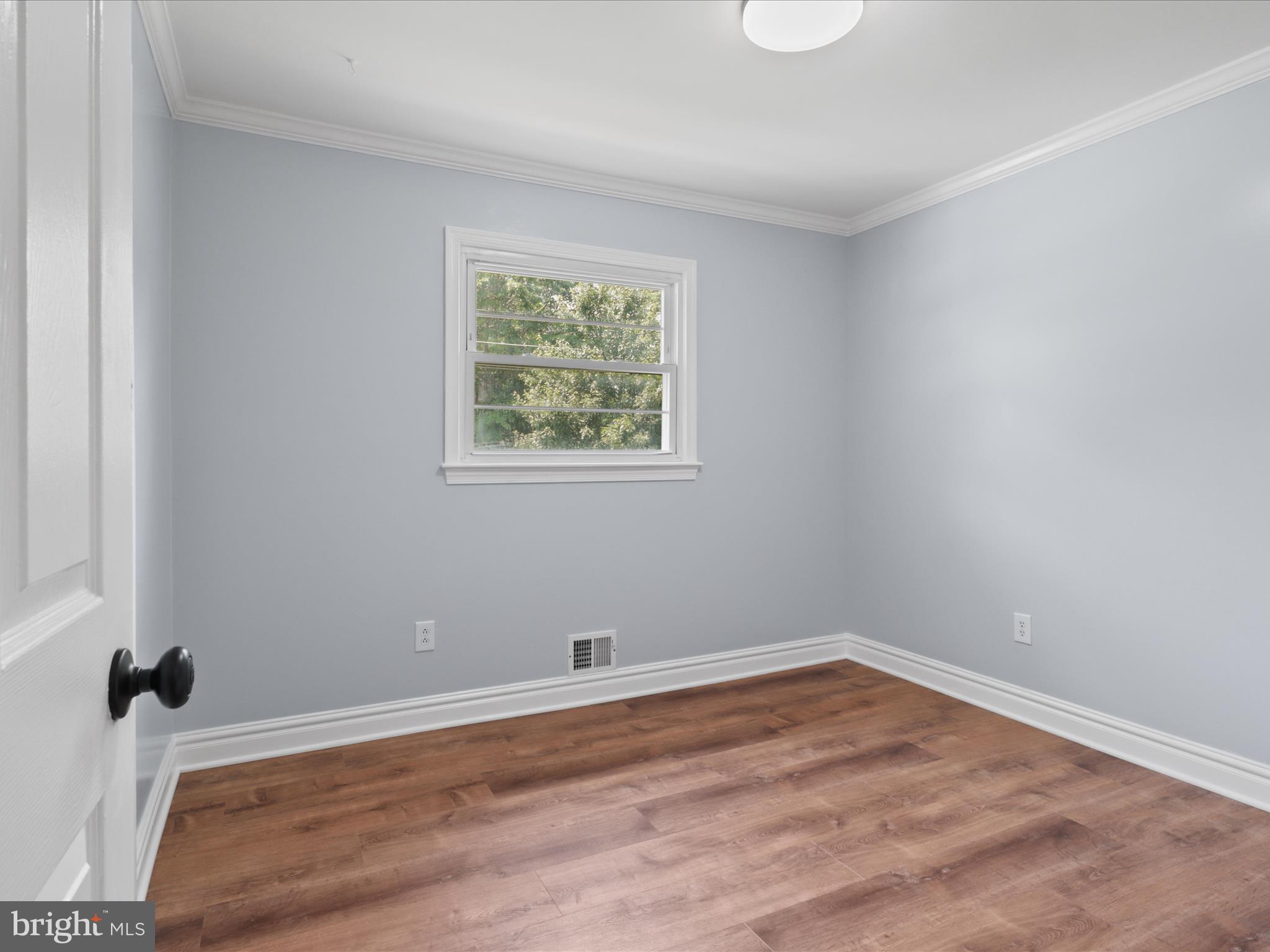 8211 Hocking Place Alexandria, VA 22309 - Photo 22 of 45 an empty room with a window