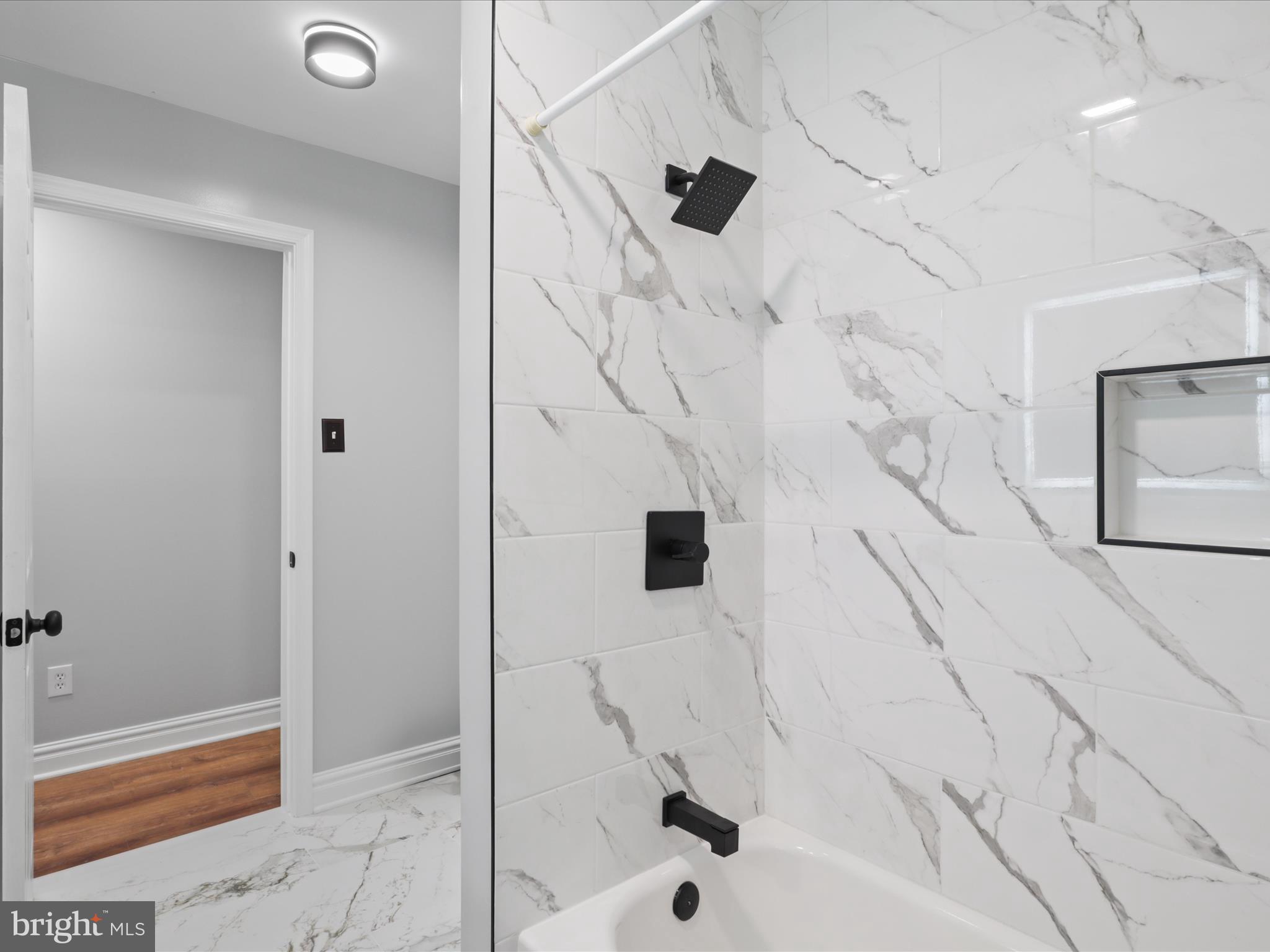 8211 Hocking Place Alexandria, VA 22309 - Photo 25 of 45 a bathroom with a shower