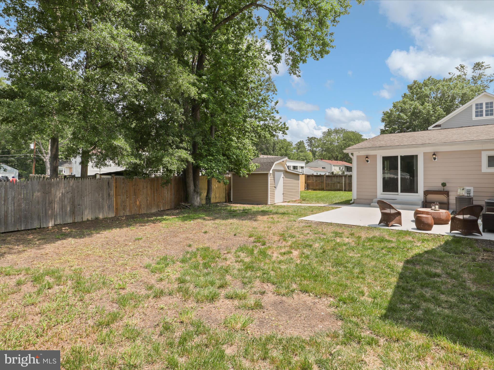 8211 Hocking Place Alexandria, VA 22309 - Photo 38 of 45 a view of a house with backyard and sitting area
