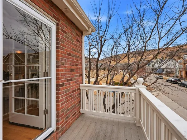 a view of a wooden house with a large window