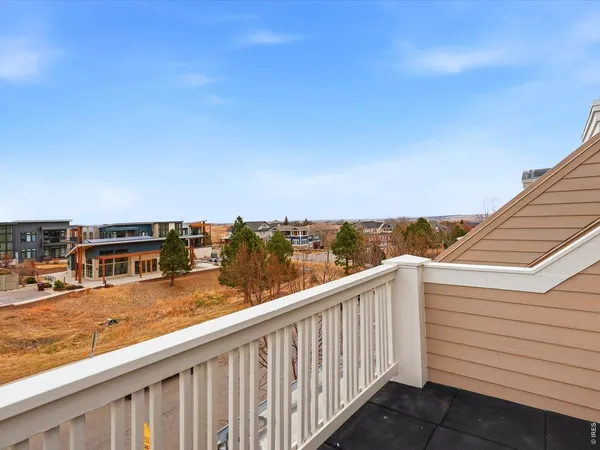 a view of a balcony with an outdoor space