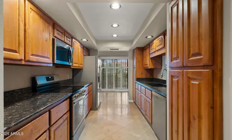 a kitchen with a stove and a microwave
