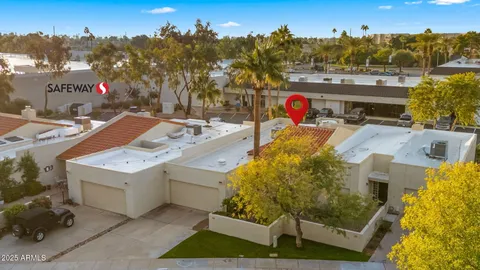 a utility room with a stove and a tub