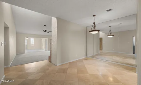 a view of a door and a window