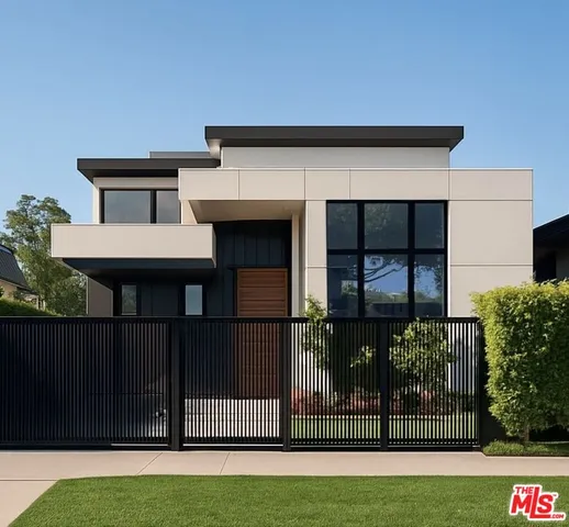 a house view with a garden space
