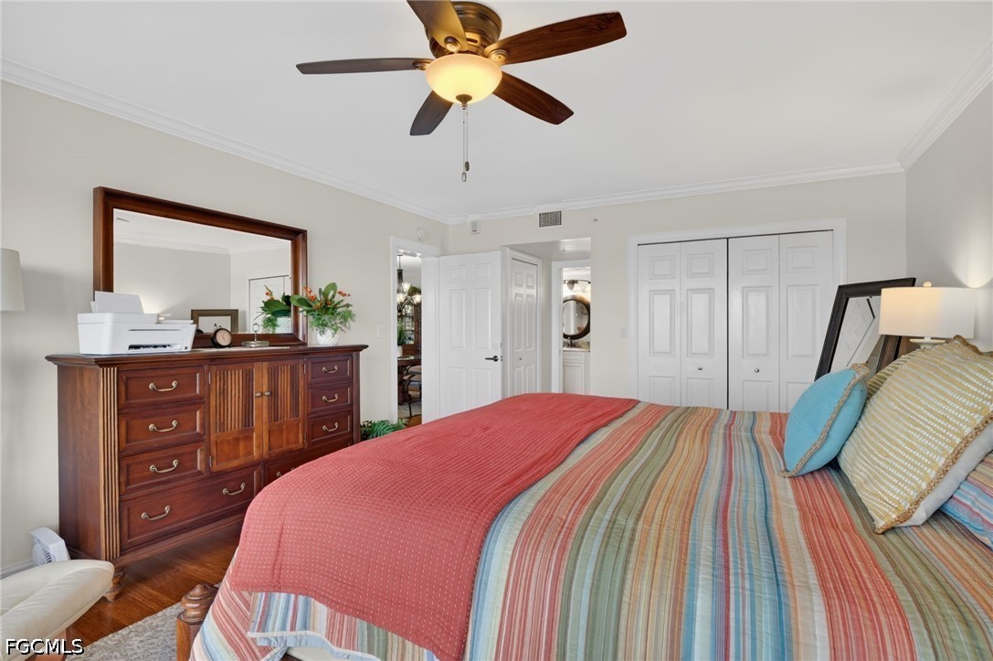 1900 Virginia Avenue, Unit 802 Fort Myers, FL 33901 - Photo 18 of 33 a bedroom with a bed and a dresser